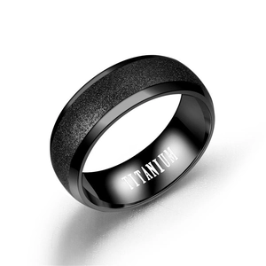 Classic black titanium steel ring with matte center finish and polished edges