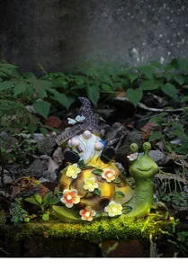 Solar powered snail fairy garden statue with welcome sign and glowing flower details