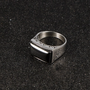 Mens stainless steel signet ring with a large rectangular black cubic zirconia stone