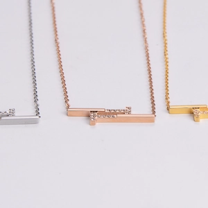 Minimalist geometric bar necklaces in silver, gold and rose gold with pavé-set stones