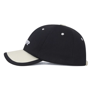 Contrast baseball cap with black body, beige brim and UP letter embroidery on side