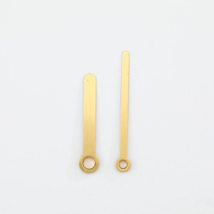 Golden quartz clock hands set made of brushed copper for DIY watch repair and assembly