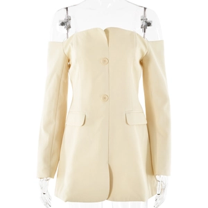 Detail of beige off-the-shoulder blazer dress with double-breasted buttons and flap pockets