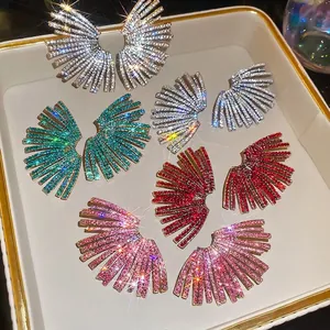 Fan-shaped geometric stud earrings with colorful rhinestones in gold display tray