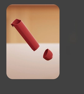 Detail view of the red seasoning jar with a detachable bottom for easy cleaning