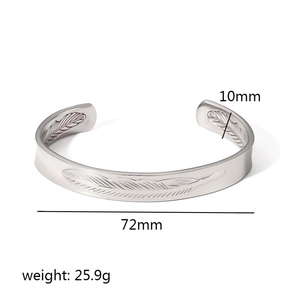Detail view of 10mm wide stainless steel feather cuff bracelet with size measurements