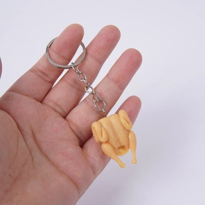 Handheld 3cm miniature roasted chicken keychain featuring realistic food model texture