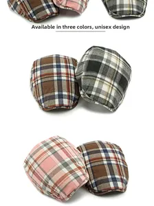 Detailed pile of vintage plaid ivy caps in brown, pink and grey colors for unisex style