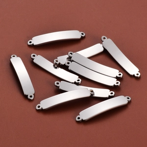 Stack of 5x30mm curved stainless steel bar connectors with dual holes for DIY jewelry