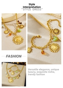 Detail of bohemian gold jewelry set with sun face, green heart, and colorful beads