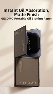 Portable bamboo charcoal facial oil blotting paper with puff in a sleek compact case