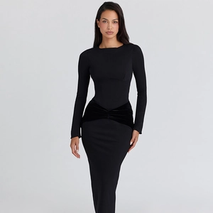 Detailed view of the velvet waist patchwork on this black long sleeve slim fit dress