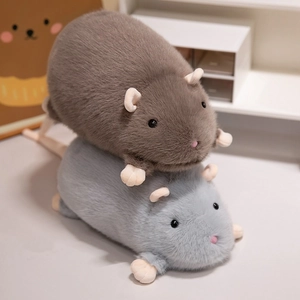 Cute plush mouse dolls in brown and grey colors displayed in a cozy home setting