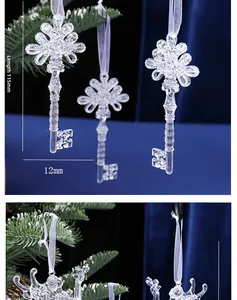 Macro detail of acrylic crystal Christmas key pendant with measurements 115mm by 12mm