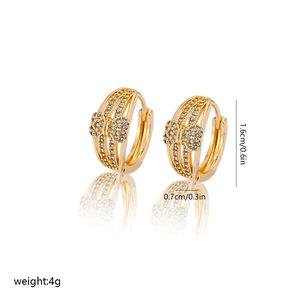 Detail view of gold hoop earrings featuring a bow design with sparkling zircon stones