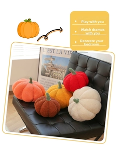 Macro detail of pumpkin plush pillows in various colors on a black leather chair