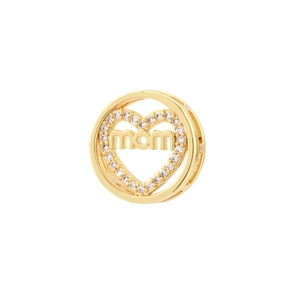 Macro detail of a gold heart charm pendant with MOM lettering and zircon inlay stones