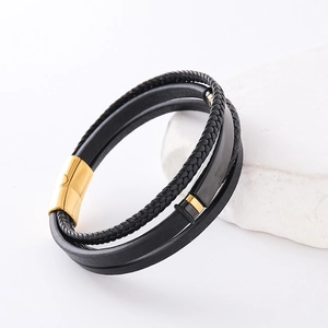 Men's multi-layer woven leather bracelet with golden magnetic clasp on white stone