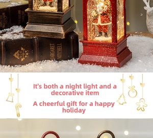 Close-up of vintage Christmas lantern night light with Santa scene and glowing LED snow effect