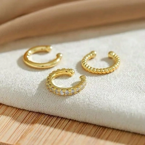 Three-piece gold plated brass C-shape ear cuff set with twisted and cubic zirconia designs
