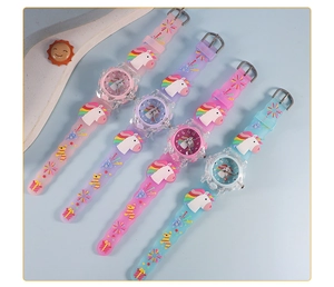 Close-up of colorful cartoon unicorn wristwatches with embossed silicone straps for kids
