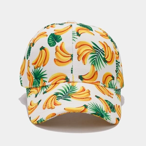 Macro shot of tropical banana and green leaf print on durable white canvas baseball cap
