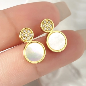 Elegant gold double round earrings with micro-inlaid zircon and white shell on fingers