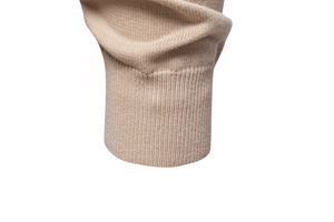 Detailed close-up of ribbed cuffs on a beige knit cardigan for men with fine texture