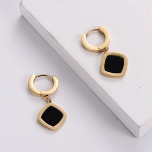 Fashionable gold square earrings with black enamel inlay and Roman numeral engravings