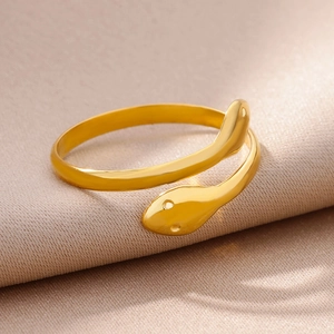Detailed view of adjustable 18k gold plated stainless steel snake ring with polished finish