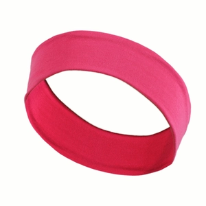 Close-up of pink elastic sports headband showing soft knit texture and fabric detail