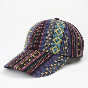 Close-up of colorful woven baseball cap showing bohemian geometric patterns and textures
