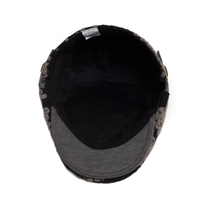 Jacquard cotton blend beret hat showing textured fabric and interior lining