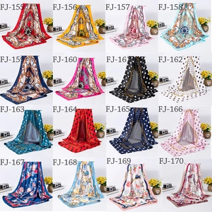 Grid display of 90cm satin square scarves in 16 assorted floral and baroque prints