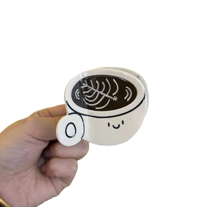 Minimalist coffee cup hair claw clip made of white and brown acrylic for high ponytails