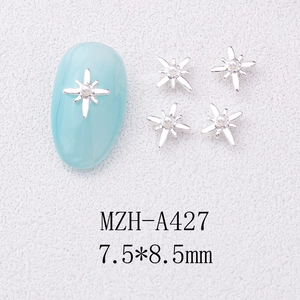 Detailed view of silver star nail charms with white pearl, sized 7.5x8.5mm for nail DIY