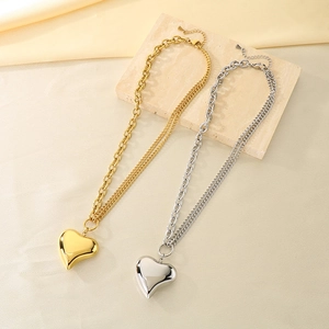 Double layer stainless steel necklace with heart pendant in gold and silver finish