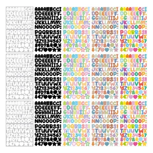 Detail of 15 sheets of colorful alphabet and number stickers for scrapbooking and DIY crafts