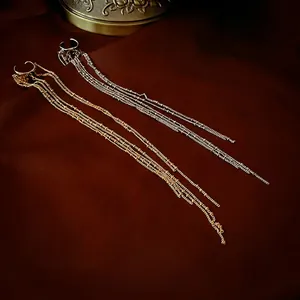 Irregular C-shaped long tassel ear cuff earrings with metal chains in gold and silver finish