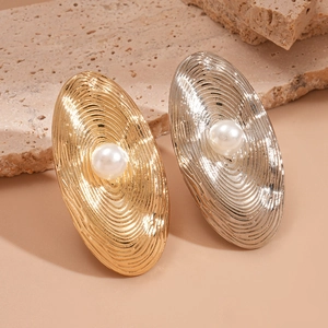 Chic oval ripple rings in gold and silver finish with elegant white faux pearl accents