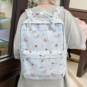 Student backpack with light blue dachshund puppy patterns and bowknot prints