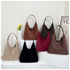 Detailed display of tote bags in suede texture across six different classic color options