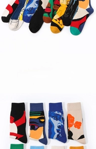 Detailed view of Picasso style abstract socks featuring colorful geometric pop art patterns