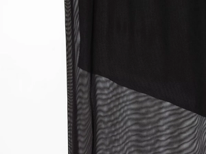 Detailed macro view of black semi-transparent mesh fabric with fine polyester texture