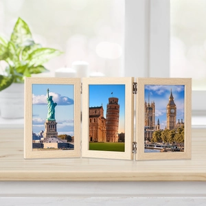 Three-frame foldable wooden photo display set with natural grain finish and metal hinges