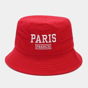 Detail of red cotton bucket hat featuring white 3D PARIS embroidered lettering