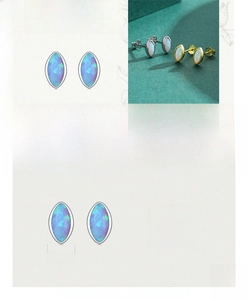Macro detail of oval opal stud earrings in 925 sterling silver with size and weight info