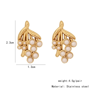 Detail view of gold stainless steel shell earrings with pearls and size dimensions