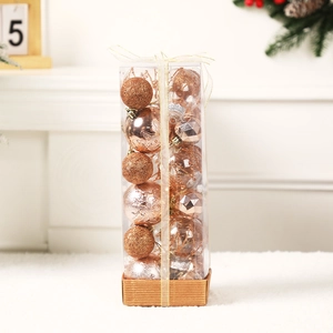 Champagne gold Christmas ball ornament set in luxury gift box on plush white carpet