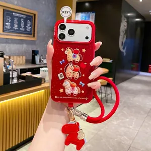 Red iPhone case with cartoon pony motifs, stars, and lucky mahjong tile with red lanyard